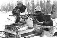 Партизаны с трофейным немецким пулеметом MG-34